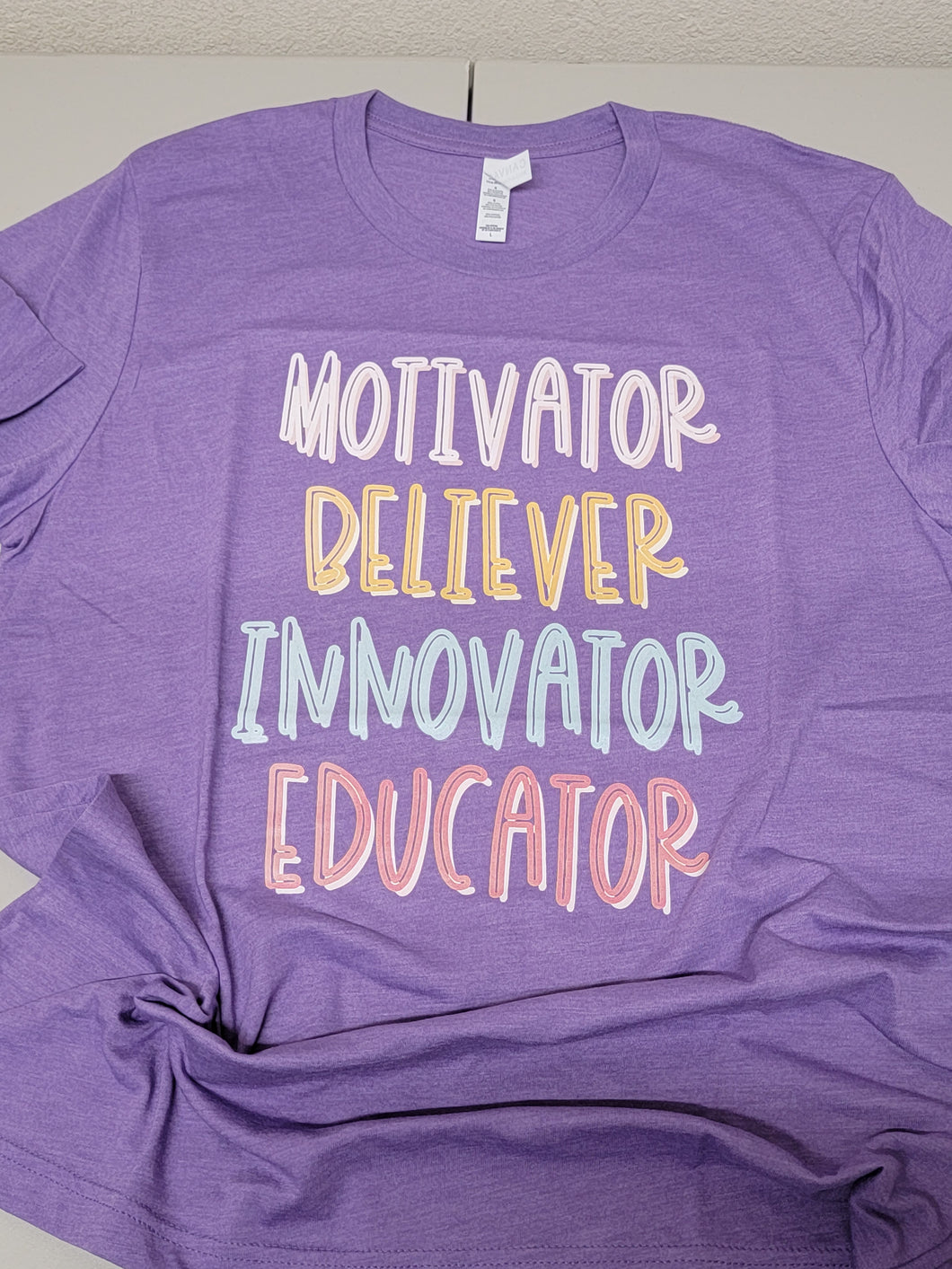 Motivator Believer... on Heather Team Purple - L (Sold as is)